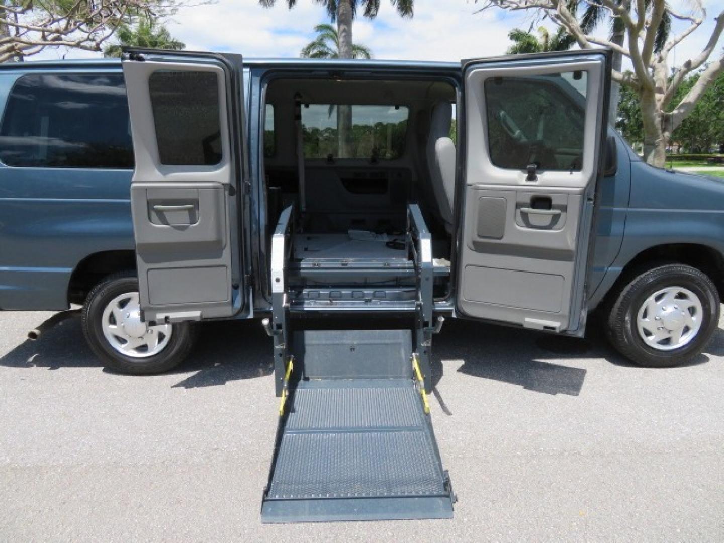 2013 Dark Blue /Gray Ford E-Series Wagon XLT (1FMNE1BW4DD) with an 4.6L V8 engine, Automatic transmission, located at 4301 Oak Circle #19, Boca Raton, FL, 33431, (954) 561-2499, 26.388861, -80.084038 - You are looking at a Gorgeous 2013 Ford E150 XLT Handicap Wheelchair Conversion Van with 22K Original Miles, Tie Down System, Power Electric VMI Side Entry Wheelchair Lift, Back Up Camera, Factory Navigation and Much Much More. This van is Awesome. This is a Nice Rust Free Van with a Clean Carfax, C - Photo#46